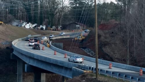 Final work is under way on the new Little River bridge on Arnold Mill Road / Georgia 140. The bridge is located on the Fulton-Cherokee County line. (Brian O'Shea, bposhea@ajc.com)