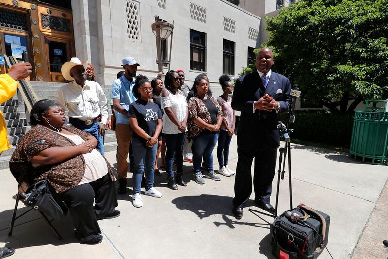 Attorney James Carter, representing the family of Tommie McGlothen, Jr., speaks to media with the family outside the Caddo Parish Courthouse in Shreveport, La., Wednesday, June 10, 2020. The family of McGlothen, a black Louisiana man who died in police custody after a videotaped altercation that shows police officers hitting and tasing him demanded answers Wednesday and that the officers be held accountable. (AP Photo/Gerald Herbert)
