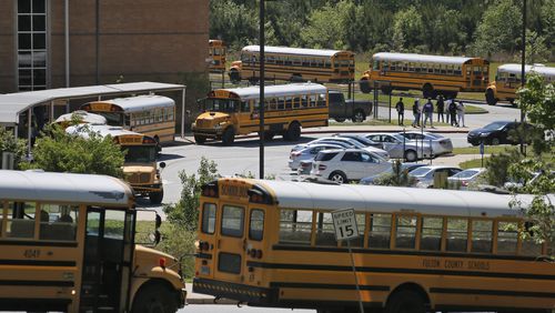 April 25, 2017 - Fairburn - The scene at Langston Hughes High School as buses line up at dismissal. Four students were killed and another injured Monday in a crash involving a tractor-trailer and a Lincoln Navigator. BOB ANDRES /BANDRES@AJC.COM