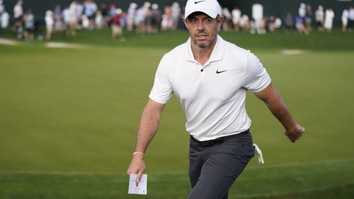 Rory McIlroy, of Northern Ireland, walks off after completing the first round of the Wells Fargo Championship golf tournament at Quail Hollow on Thursday, May 9, 2024, in Charlotte, N.C. (AP Photo/Erik Verduzco)
