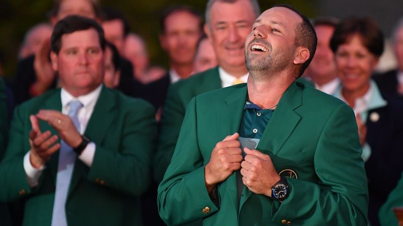 Sergio Garcia embraces wearing the green jacket during championship ceremony Sunday, April 9, 2017, at the 81st Masters tournament at the Augusta National Golf Club.