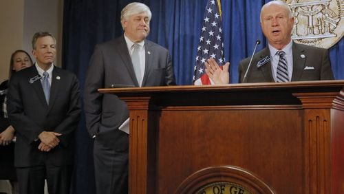 State Sens. Jesse Stone (from left), Bill Cowsert and Butch Miller held a press conference to discuss the adoption bill after its passage Thursday. The Georgia Senate passed House Bill 159 after two hours of debate. The bill, carried by Stone in the Senate, is meant to make adoptions easier and faster, but senators amended it last week to add a provision that Gov. Nathan Deal vetoed last year. BOB ANDRES /BANDRES@AJC.COM