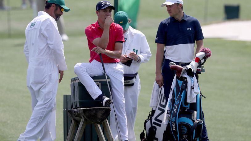 Justin Thomas, left, and Jordan Spieth wait to hit on the fourth tee during their practice round for the Masters at Augusta National Golf Club on Wednesday, April 7, 2021, in Augusta. Curtis Compton/ccompton@ajc.com