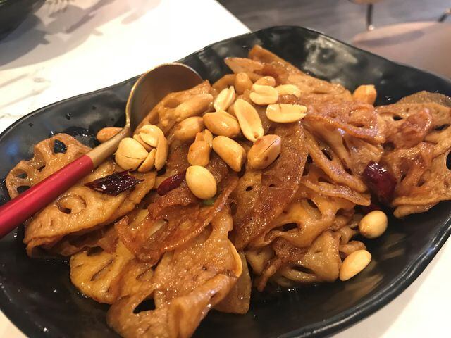 Review: Fans of Gu’s dumplings and noodles delighted it’s back on Buford