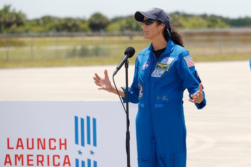 NASA astronaut Suni Williams speaks to the media after they arrived at the Kennedy Space Center, Thursday, April 25, 2024, in Cape Canaveral, Fla. The two test pilots will launch aboard Boeing's Starliner capsule atop an Atlas rocket to the International Space Station, scheduled for liftoff on May 6, 2024. (AP Photo/Terry Renna)