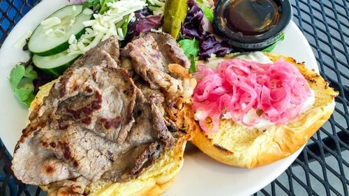 The Baltimore Pit Beef sandwich at the Brake Pad in College Park. CONTRIBUTED BY HENRI HOLLIS