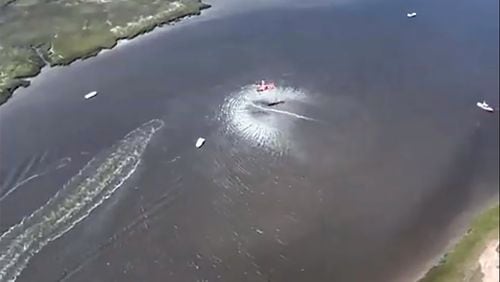 The Coast Guard conducts a rescue at the scene of a deadly boat crash on Memorial Day weekend 2022. Four members of the Leffler family were killed in a boating crash. Parents, Lori and Chris Leffler, along with sons Zach and Nate died. Daughter Kate survived. (U.S. Coast Guard video screenshot)