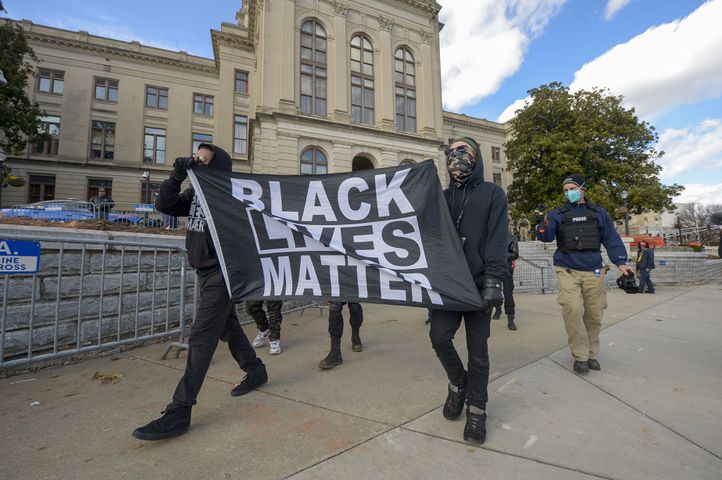 A church installs a Black Lives Matter banner ahead of pro-Trump protests  in Washington, DC