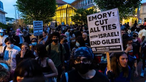 Pro-Palestine protesters rally in the evening at Emory’s campus in Atlanta on Thursday, April 25, 2024. (Arvin Temkar / AJC)