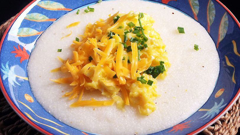Grits with cheddar cheese, chives and scrambled eggs. (Nate Guidry/Pittsburgh Post-Gazette/TNS)