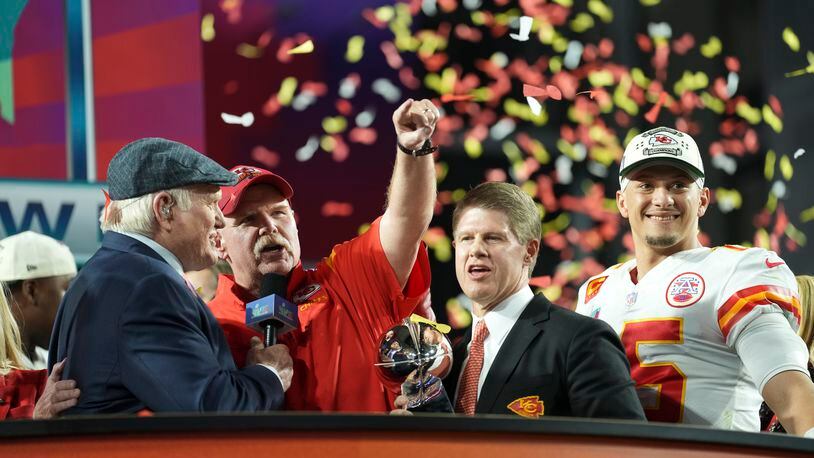 Kansas City Chiefs head coach Andy Reid, owner Clark Hunt and quarterback Patrick Mahomes celebrate after winning the Super Bowl LVII against Philadelphia Eagles at State Farm Stadium in Glendale, Ariz., on Feb. 12, 2023. (Doug Mills/The New York Times)