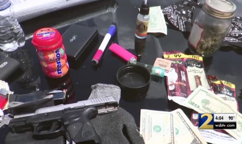 Marijuana, a gun and weight scales were allegedly found in Callaway's ice cream truck. (Credit: Channel 2 Action News)