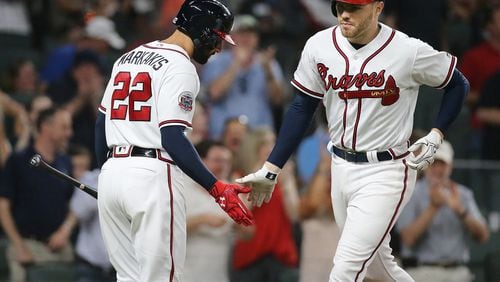 Freddie Freeman hit this third-inning home run Wednesday against the Nationals to break the Atlanta Braves franchise record by reaching base for the 12th consecutive plate appearance. (Curtis Compton/ccompton@ajc.com)