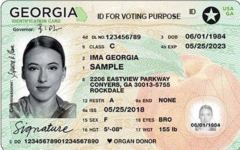 Free voter ID cards issued by the Georgia Department of Driver Services can be used for absentee voting without having to make a copy because they include an ID number that voters can use on their absentee ballot application.