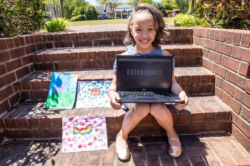 Alani Thorns, 8, created paintings and hosted a virtual art show raising more than $7000 for the CDC thanks to Lysol matching her funds. Jenni Girtman / Atlanta Journal-Constitution