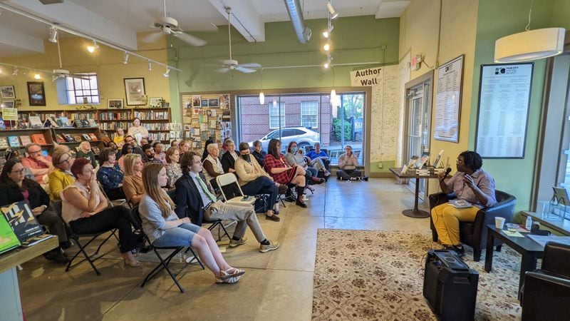 Marlanda Dekine reads at the book launch for their poetry collection "Thresh & Hold" at the Hub City Bookshop in Spartanburg, South Carolina. (Courtesy of Hub City Press/ Meg Reid)