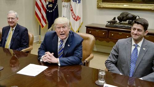 President Donald Trump speaks as Senate Majority Leader Mitch McConnell, left, and House Speaker Paul Ryan listen during a meeting with House and Senate leadership on June 6, 2017 in the Roosevelt Room of the White House in Washington, D.C. (Olivier Douliery/Abaca Press/TNS)