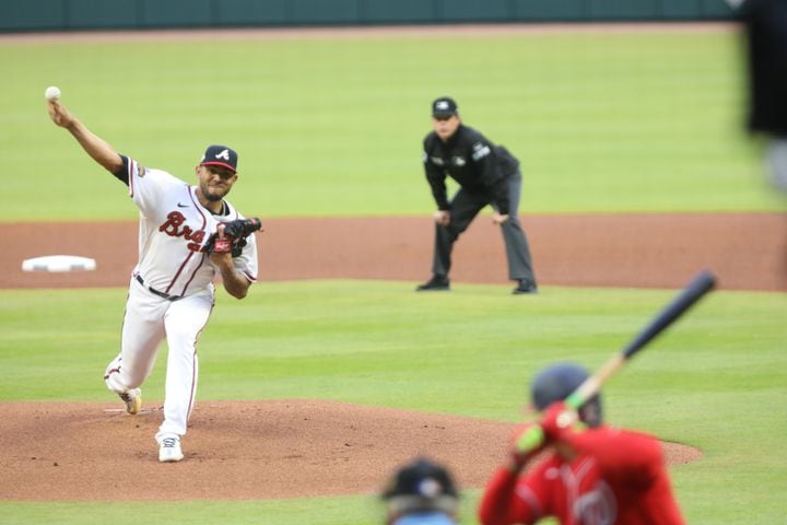 Braves starting pitcher Huascar Ynoa delivers during the first game of the series against the Nationals on Monday night at Truist Park. (Miguel Martinez / miguel.martinezjimenez@ajc.com)