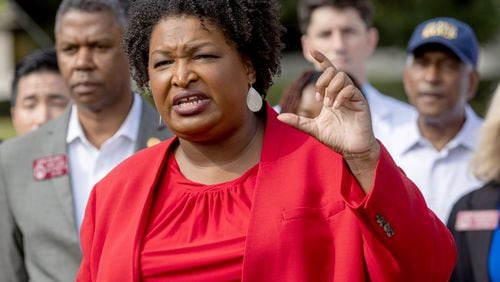 Stacey Abrams and other top Democrats are including Forsyth County in campaign stops. She is pictured speaking at a news conference in Atlanta on Sep. 2, 2022. Steve Schaefer/steve.schaefer@ajc.com)