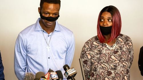 Tywouna Walker (R) stands next to her son Roderick Walker as he talks to the press during a press conference in Atlanta, September 18, 2020.   STEVE SCHAEFER / SPECIAL TO THE AJC 