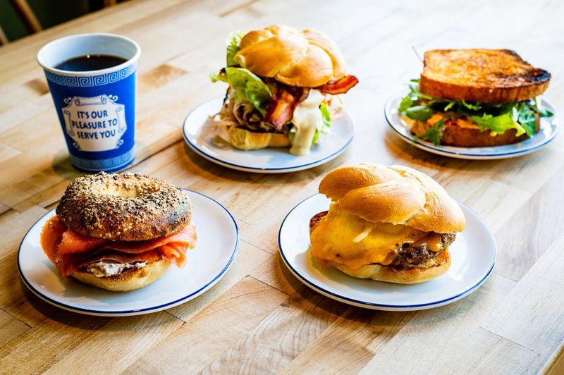A selection of sandwiches at B-Side includes (clockwise from top): turkey and bacon club, pimento cheese, morning combo with sausage, and an everything bagel with smoked salmon and olive and caper schmear. CONTRIBUTED BY HENRI HOLLIS