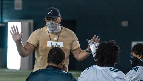 Georgia Tech coach Geoff Collins addresses his team at a summer training session July 22, 2020.