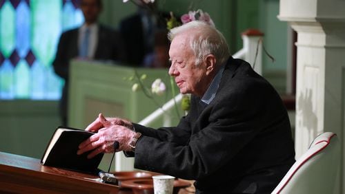 June 9, 2019 Plains: President Jimmy Carter, 94, the 39th U.S. president and Plains native, opens his Bible to begin the lesson as he returns to Maranatha Baptist Church to teach Sunday School less than a month after falling and breaking his hip on Sunday, June 9, 2019, in Plains.  Curtis Compton/ccompton@ajc.com