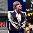 Some of the big entertainment stories in Atlanta: CNN leaving CNN Center, Elton John selling his condo and the four-month actors strike. AJC FILE PHOTOS/AP