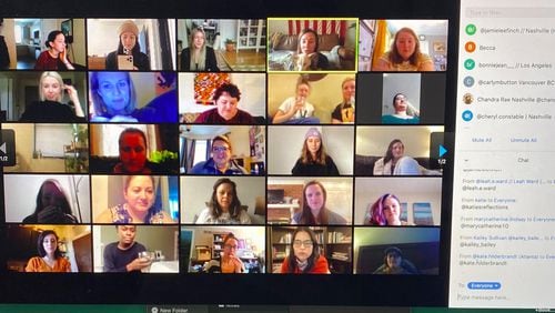 In this March 16, 2020 photo provided by Jamie Lee Finch, a laptop on a desk in Nashville, Tenn., showing people gathered together online for a virtual happy hour is shown amid the coronavirus pandemic. (Jamie Lee Finch via AP)