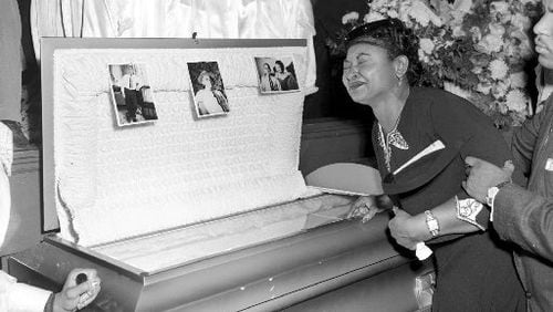 In this Sept. 6, 1955, photo, Mamie Till Mobley weeps at her son’s funeral in Chicago. Emmett Till was so badly beaten that his body was not recognizable. But his mother insisted on an open casket so the world could see the horrors of racism. (AP Photo/Chicago Sun-Times)