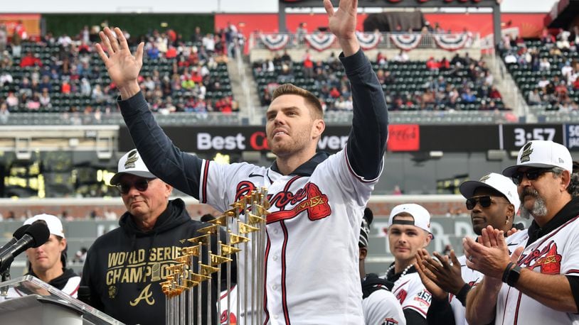 November 5, 2021 Atlanta - Atlanta Braves first baseman Freddie Freeman waves to fans during Truist Park Ceremony celebrating the Atlanta Braves' World Series win on Friday, November 5, 2021. Atlanta is partying on Friday like itÕs 1995, the last time the Atlanta Braves were World Series champions. The Atlanta Journal-Constitution is offering live updates from the Braves parade route in downtown Atlanta, Cobb County and inside Truist Park. (Hyosub Shin / Hyosub.Shin@ajc.com)
