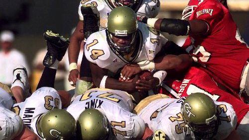 Georgia Tech quarterback Joe Hamilton (14) also rushed for 1,758 yards at Tech, another school record. In 1999, he ran for 734 yards, setting another mark.