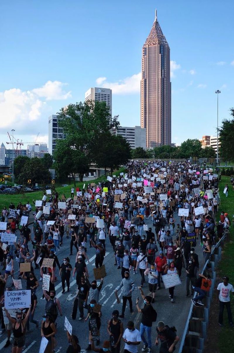 Marchers are on the move Monday during protests downtown.