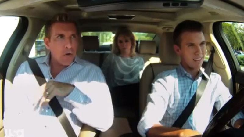 Roswell's Todd Chrisley (left) stars in "Chrisley Knows Best," a new reality show debuting March 11 at 10 p.m.