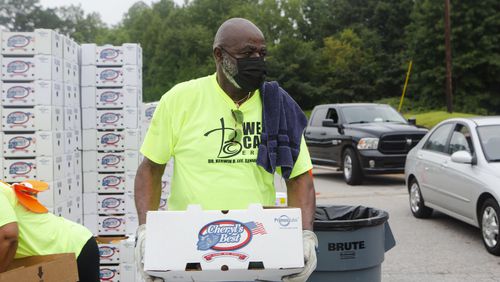 Robert Lindsey volunteers during a food giveaway event at Berean Christian Church on Saturday, August 27, 2022, in Stone Mountain. The free food was paid for using federal COVID-19 relief funds, and was distributed at churches throughout Dekalb County. CHRISTINA MATACOTTA FOR THE ATLANTA JOURNAL-CONSTITUTION.