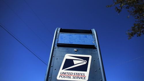 Residents of an apartment complex in Marietta's Powers Ferry Road corridor say the U.S. Postal Service stopped delivering mail to their apartment complexes recently after several mailboxes were broken into. (AJC file)