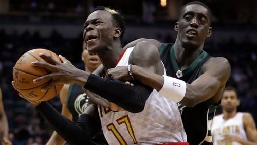 Atlanta Hawks’ Dennis Schroder is fouled by Milwaukee Bucks’ Tony Snell during the second half of an NBA basketball game Friday, March 24, 2017, in Milwaukee. (AP Photo/Morry Gash)