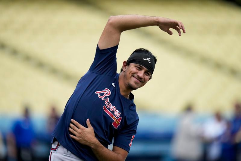 Atlanta Braves' Nicky Lopez stretches during warmups before the game against the Los Angeles Dodgers Saturday, Sept. 2, 2023, in Los Angeles. (AP Photo/Jae C. Hong)