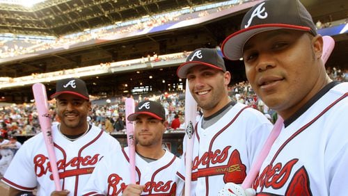 Former Braves players expected to participate in alumni weekend Aug. 16-18 include (far left) Brian Jordan, (third from left) Jeff Francoeur and Andruw Jones. (AJC file photo/Ben Gray)