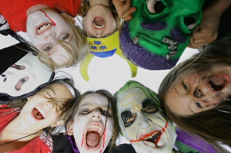 SYDNEY, AUSTRALIA - OCTOBER 31:  A grop of children pose in costume before trick or treating home on Halloween Day in North Bondi on October 31, 2008 in Sydney, Australia. Halloween, also known as Hallowe'en and shortened from its original form of All Hallows' Even, is internationally celebrated on October 31 and originates from the ancient Celtic festival of Samhain, which was a celebration recognising the end of the harvest in Gaelic culture.  (Photo by Sergio Dionisio/Getty Images)