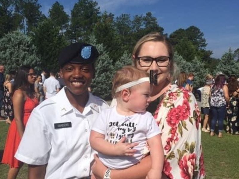 Kennedy Sanders, left, with close friend Emily Middleton and Middleton's daughter, Addi, at Sanders' graduation from Army boot camp.