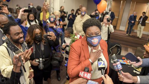 Mayoral candidate and City Council President Felicia Moore speaks to reporters during an election night party Tuesday. (Daniel Varnado/ For the Atlanta Journal-Constitution)