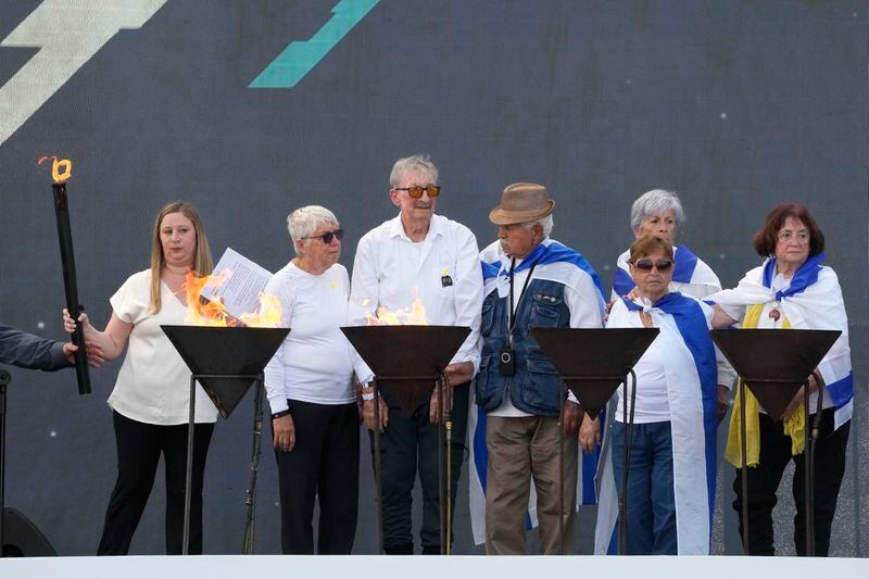 Holocaust survivors attend a ceremony at the former Nazi German death camp of Auschwitz-Birkenau during the annual Holocaust remembrance event, the "March of the Living" in memory of the six million Holocaust victims in Oswiecim, Poland, Monday, May 6, 2024. The event comes amid the dramatic backdrop of the violence of the Israel-Hamas war after the Oct. 7 Hamas attack, the deadliest violence against Jews since the Holocaust, and as pro-Palestinian protests sweep U.S. campuses. (AP Photo/Czarek Sokolowski)