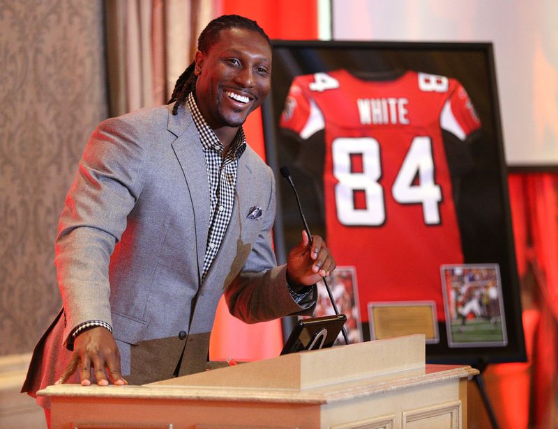 June 12, 2017, Atlanta: Falcons wide receiver Roddy White is all smiles during his speech while being honored by the Falcons as he officially retires from the NFL as the Falcons all-time leading receiver on Monday, June 12, 2017, in Atlanta. Curtis Compton/ccompton@ajc.com