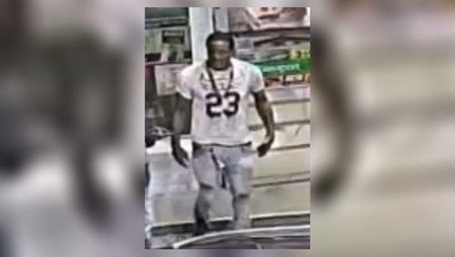 Police are offering a reward of up to $5,000 for information identifying this suspect in a May 21 armed robbery outside an Exxon gas station along Joseph E. Boone Boulevard.
