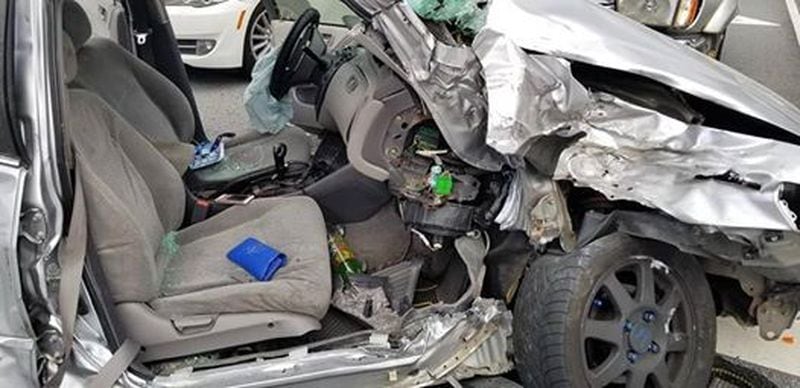 A woman required extrication after a wreck Wednesday, authorities said.