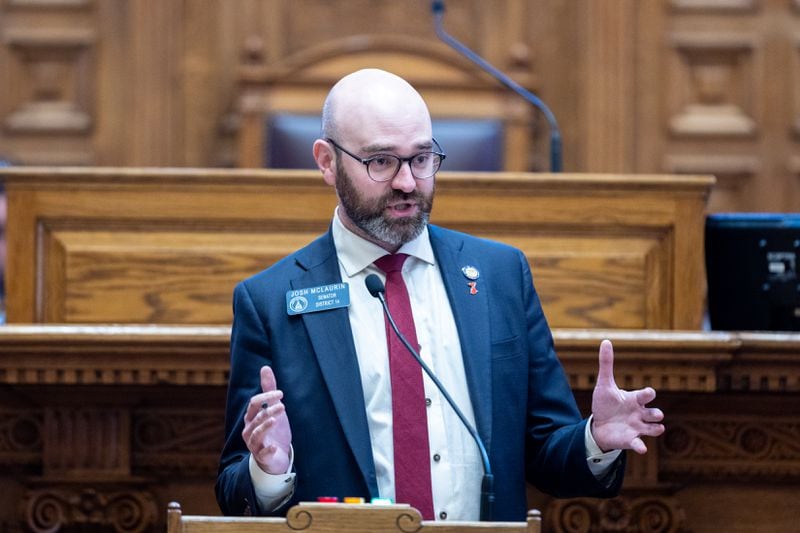 State Sen. Josh McLaurin, D-Sandy Springs, speaks on Senate Bill 63, regarding bonds and bails, in the Senate at the Capitol in Atlanta on Thursday, February 1, 2024. McLaurin is introducing a new bill to regulate booting. (Arvin Temkar/arvin.temkar@ajc.com)