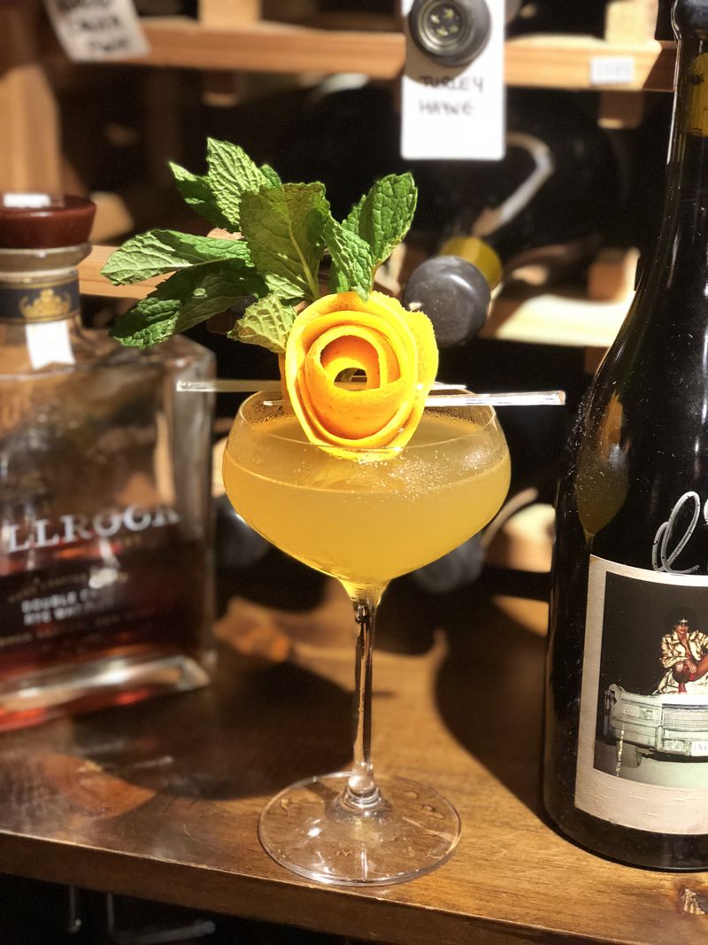 The French Quarter at Ray's at Killer Creek is garnished with orange blossom and mint.