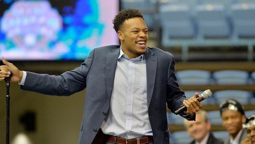 Nate Britt of the North Carolina Tar Heels laughs while on stage after being asked to speak to the crowd during their welcome-home reception for the NCAA men’s basketball team on April 4, 2017 in Chapel Hill, North Carolina. The Tar Heels defeated the Gonzaga Bulldogs 71-65 to win the national championship. (Photo by Sara D. Davis/Getty Images)