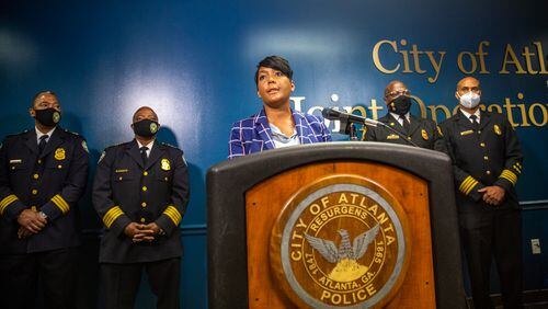 After the approval vote of the Public Safety Training Center this week, Mayor Mayor Keisha Lance Bottoms, Atlanta Police Chief Rodney Bryant, Chief Rod Smith of the Atlanta Fire Rescue Department and Dave Wilkinson of the Atlanta Police Foundation address questions about the facility, it's location and the concerns of the community Thursday, Sept 9, 2021.  (Jenni Girtman for The Atlanta Journal-Constitution)
